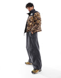 The North Face 1996 Nuptse Down Puffer Jacket Brown Abstract